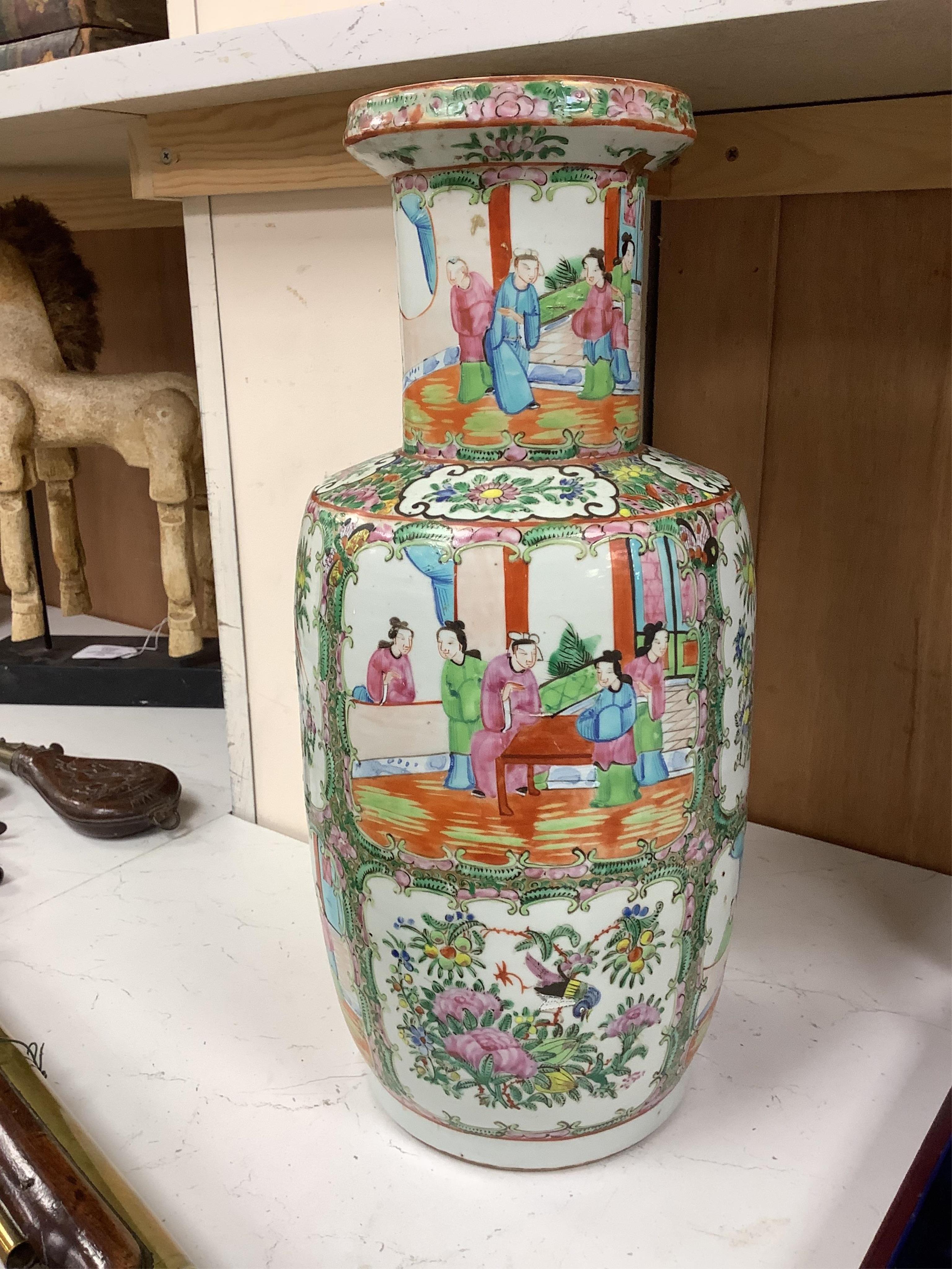 A 19th century Chinese famille rose baluster vase enamelled with flowers and figures, 44cm high